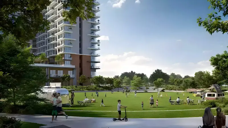 Greencrest at Dubai Hills Estate — Emaar tower above the community parkland